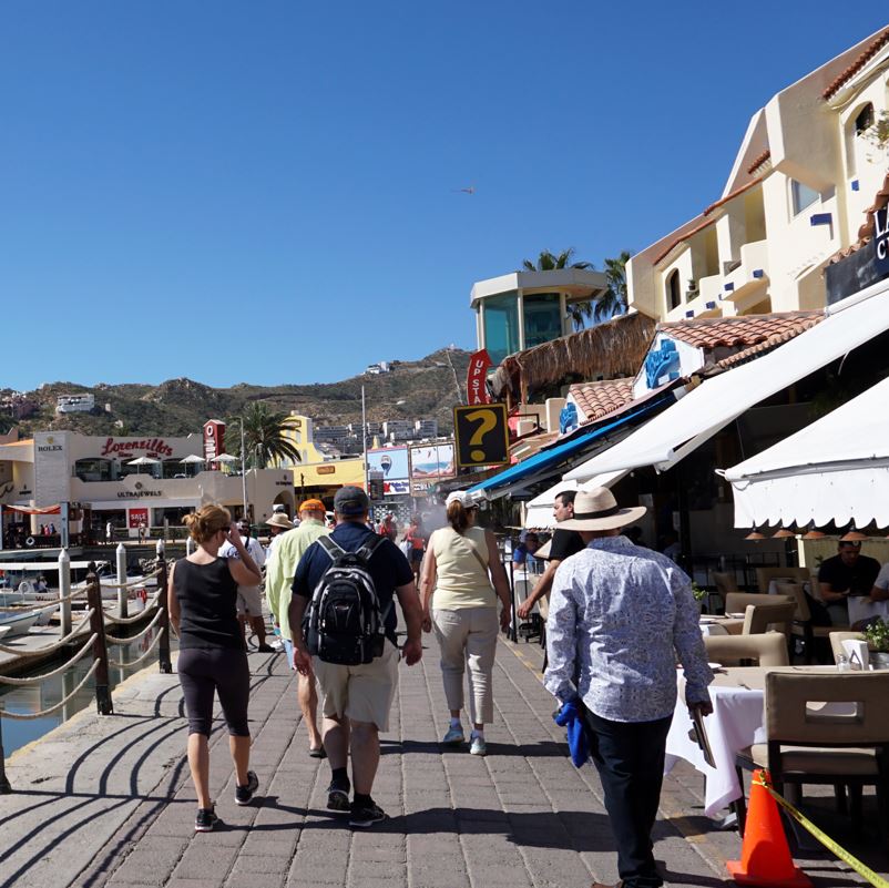 Tourists Walking In The Cabo San Lucas Marina