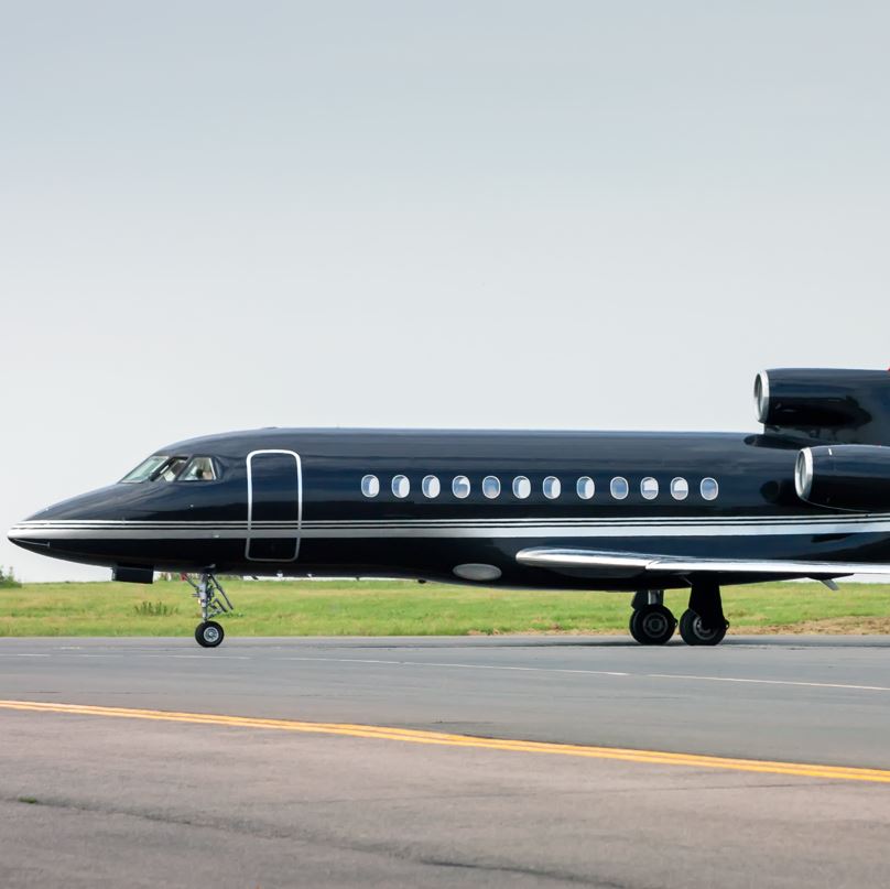 All black private jet like the ones used by Aero