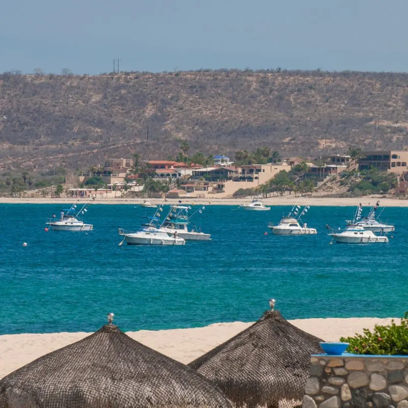 Barilles Mexico, Boats in the Water and Hills in the Background.