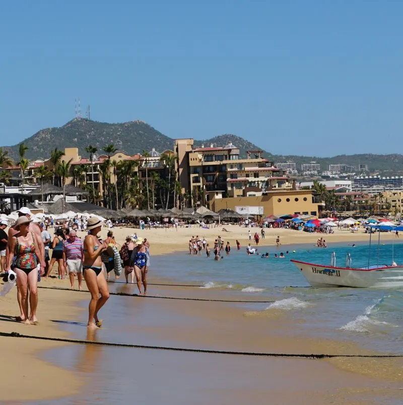 Crowded los cabos beach on a sunny day