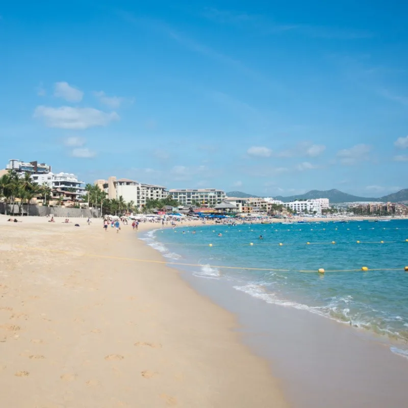 Empty Cabo San Lucas Beach Surrounded by Resorts