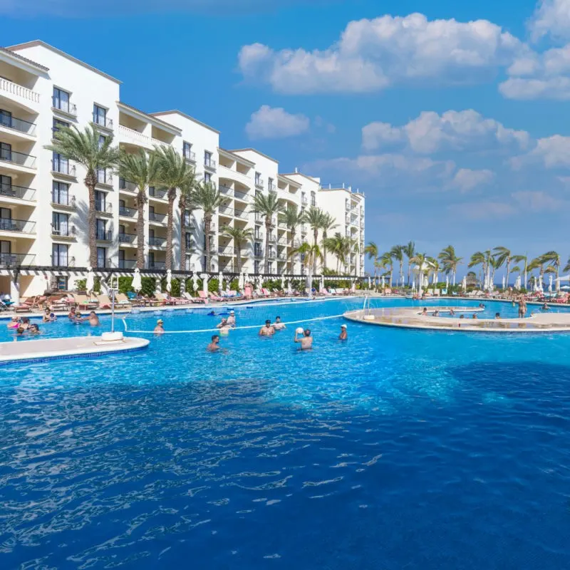 Guests Enjoying Pool Activities at a Resort in San Jose del Cabo Mexico