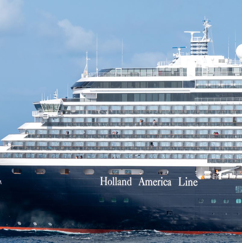 Holland America Line Ships With People On Balconies in Multiple Decks
