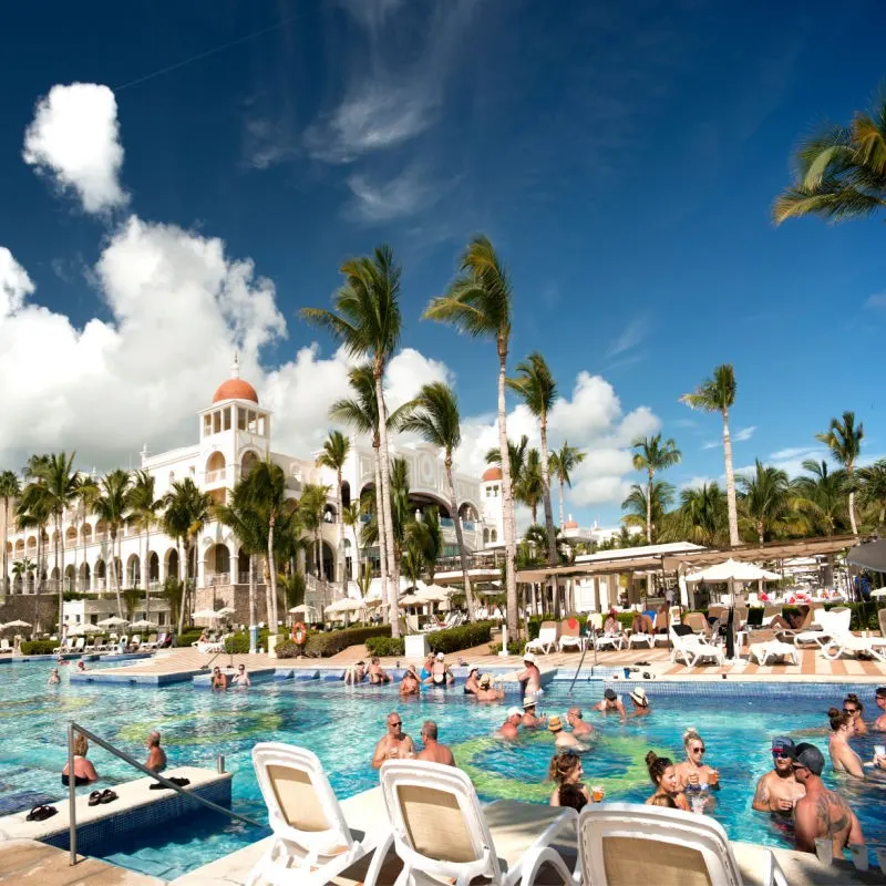 Los Cabos Resort Packed with Tourists Having Fun in the Pool