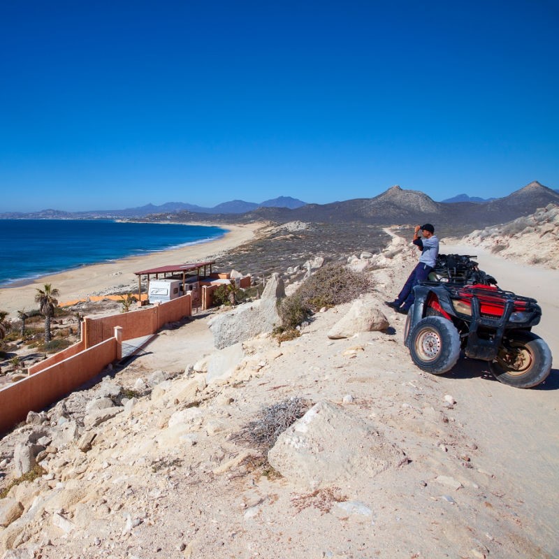 Man on an ATV in the Desert in Cabo San Lucas