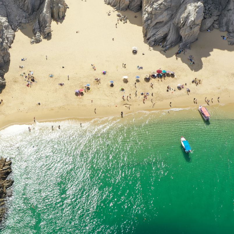 Overhead view of tourists on lovers beach in los cabos