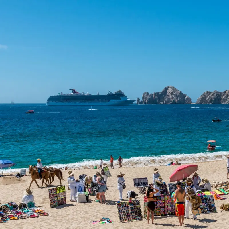 Busy Beach Full of Tourists During Spring Break in Cabo San Lucas