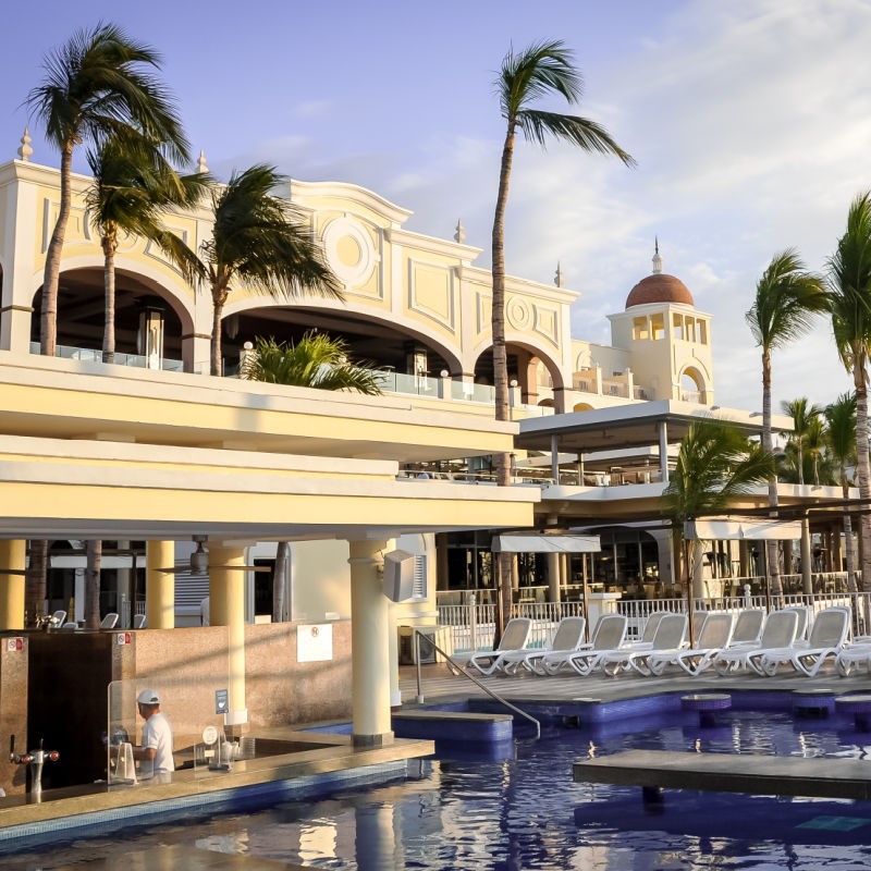Small RIU Palace Pool with Chairs and a Swim Up Bar in Cabo San Lucas