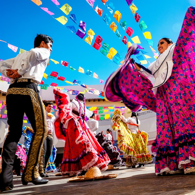 Regional dancers in colorful dresses Mexico