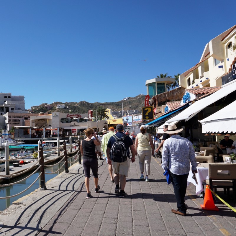 Tourists Walking Past Restaurants in the Cabo San Lucas Marina Area