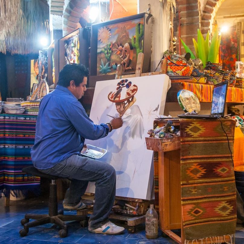 Traditional Mexican painter in a local studio