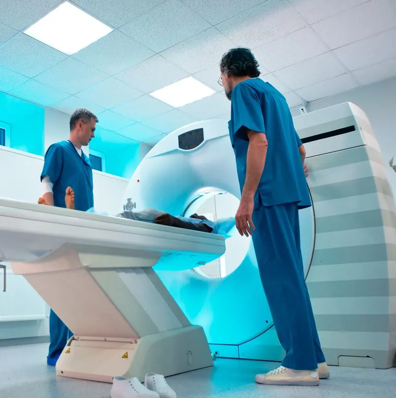 Doctors doing an MRI on a patient