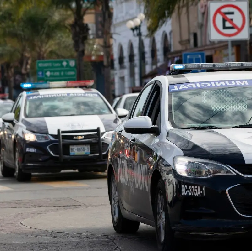 Municipal police cars on patrol in Mexico