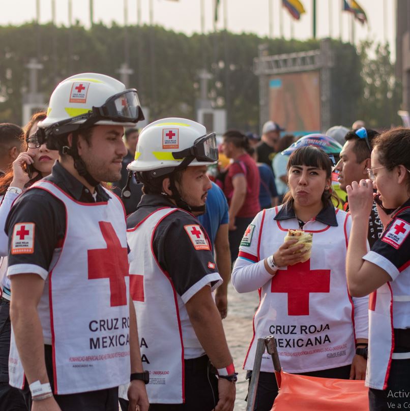 Mexican red cross workers relaxing while taking care of people at a concert