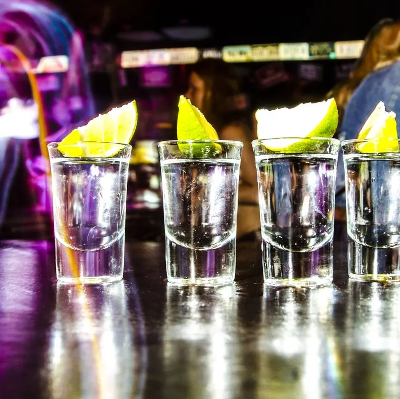 Shots of Tequila Getting Ready To Be Served At A Bar