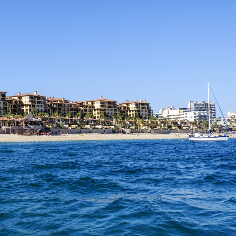Boat on the Water in Front of Medano Beach in Cabo San Lucas, Mexico