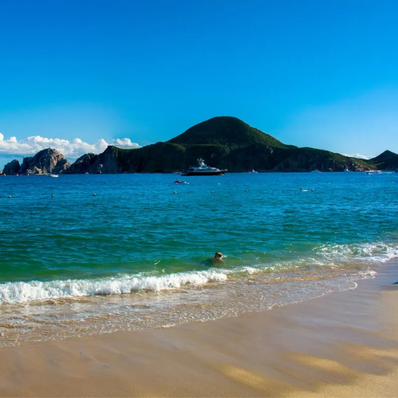 Medano Beach and the Arch with Boats and Tourists in View