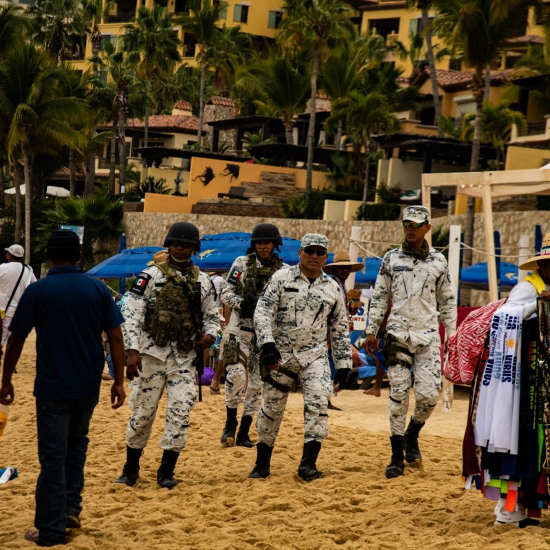 Military Walking on a Beach in Cabo San Lucas