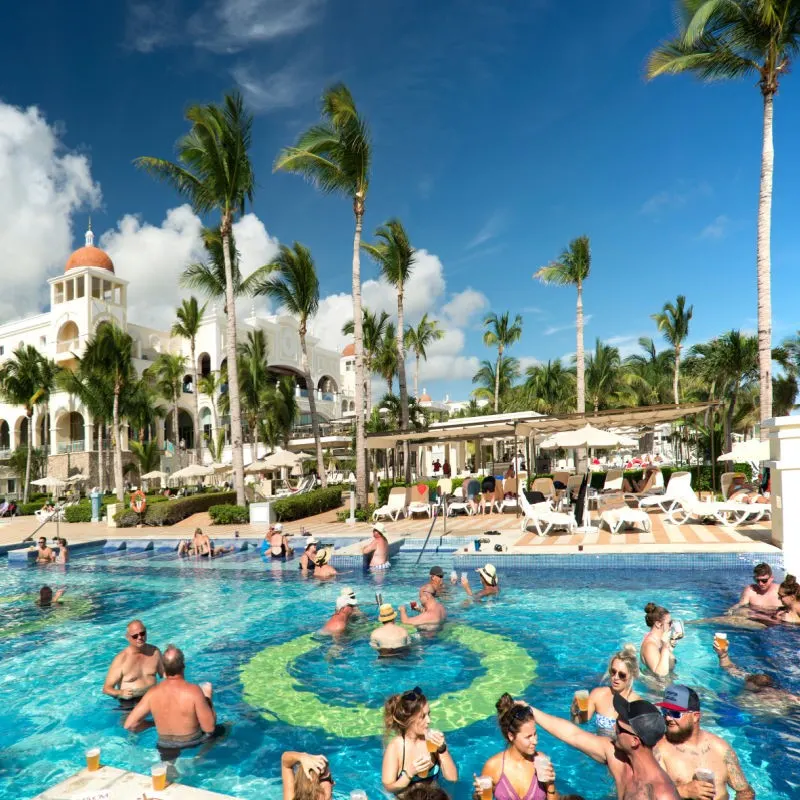 Tourists in a Beautiful Resort Pool in Cabo San Lucas, Mexico