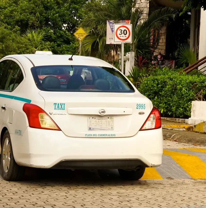 cab in a mexican beach town with speed bumps