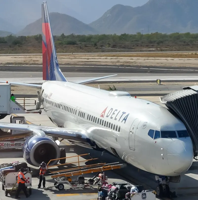 Delta airplane parked at los cabos airport
