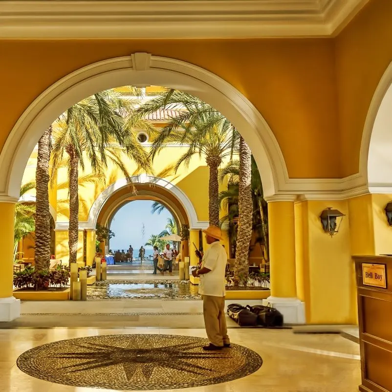 Bellman in Los Cabos hotel lobby