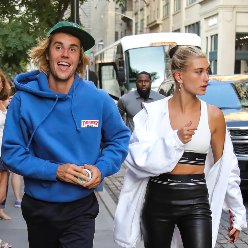 Justin & Hailey Bieber walking down the street in New York