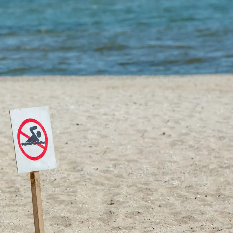 No swimming sign on a beach