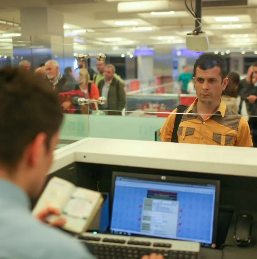 Passport control station at airport immigration