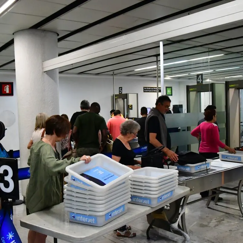 Travelers At A Mexican Airport Checkpoint