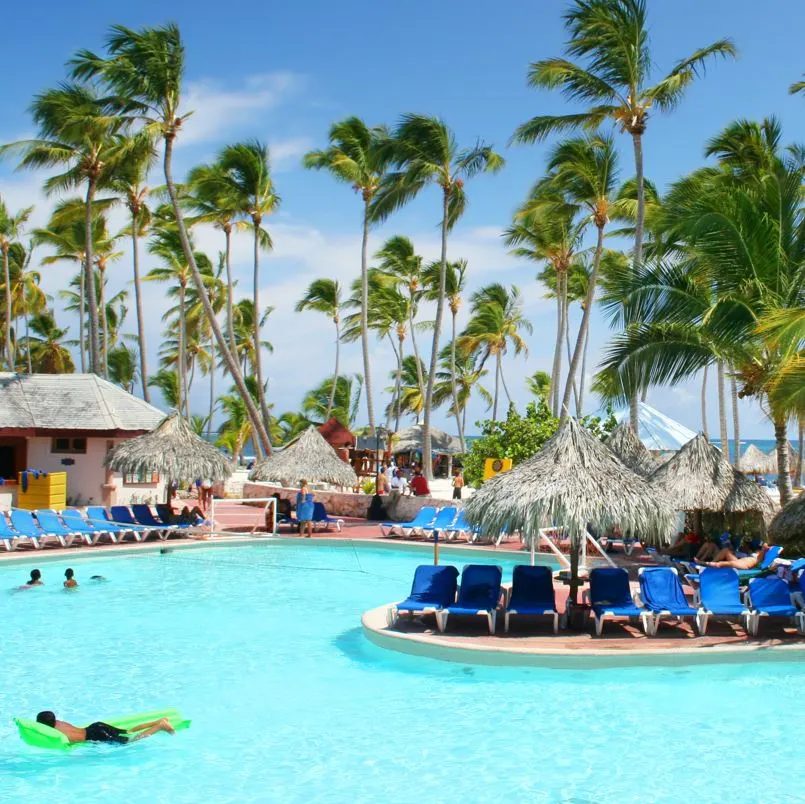 People At A Pool In An All Inclusive Resort