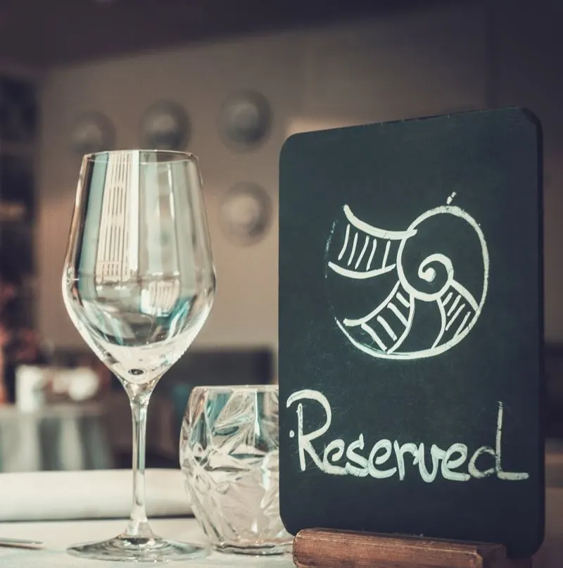 Reserved Sign At A Restaurant