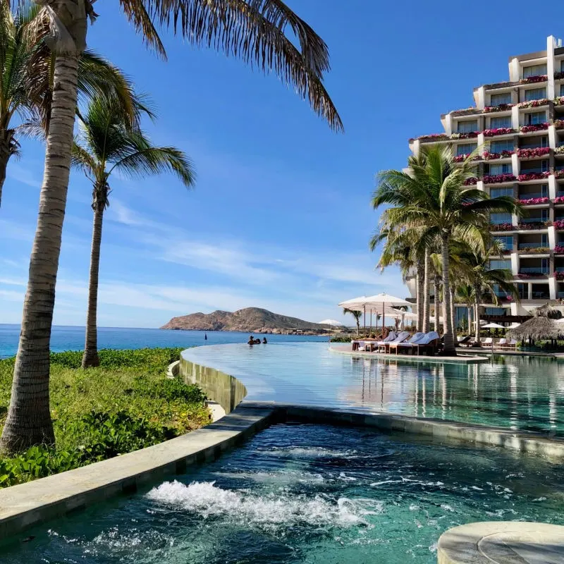 Pool at the Grand Velas Los Cabos with a View of Land's End in the Background