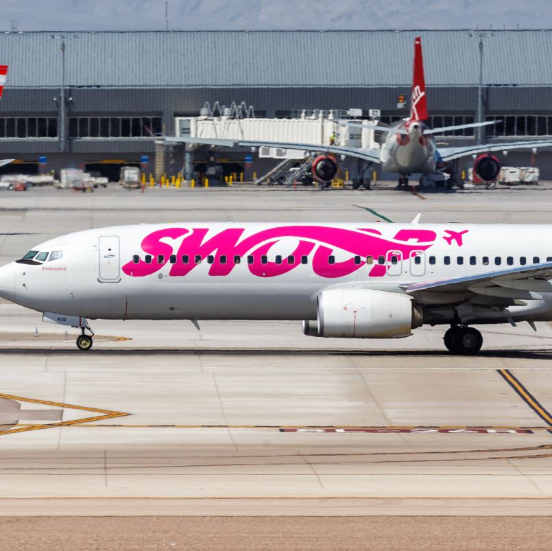 Swoop Airplane On A Runway At An American Airport