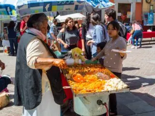 Street food vendor preparing food.