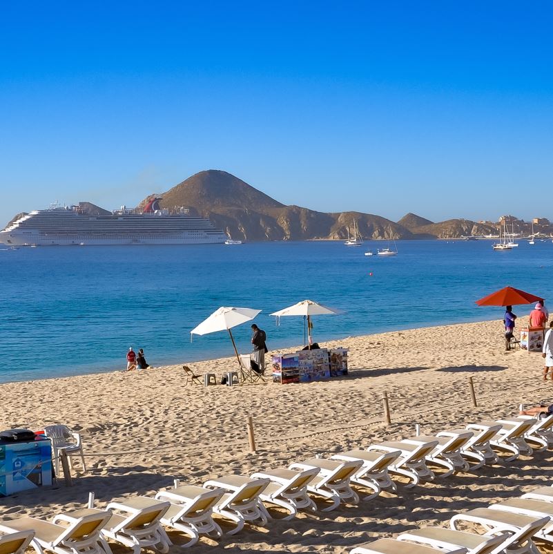 People on the beach in Los Cabos.