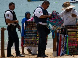 Los Cabos Increases Security On Medano Beach, In Bars, And In Nightclubs As Thousands Of Tourists Arrive
