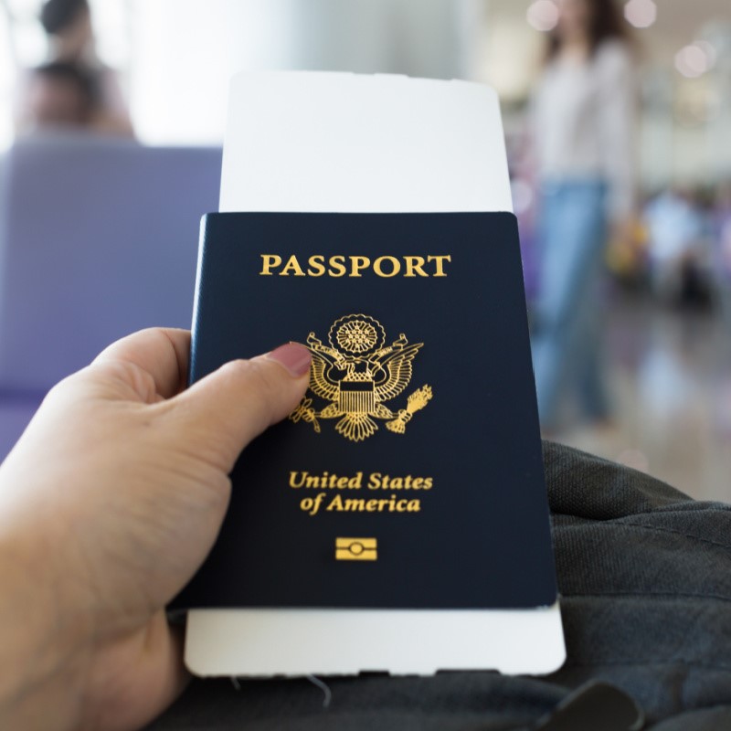 Traveler With U.S. Passport Waiting at Airport