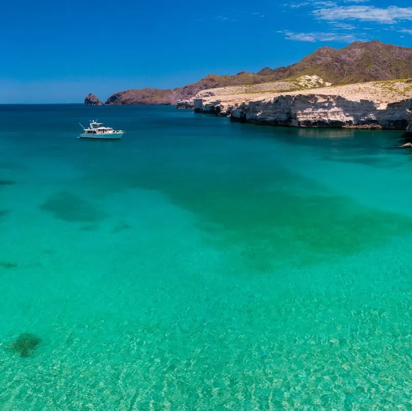 Yacht Coming Into A Cove On The Shores of Loreto Baja California Sur