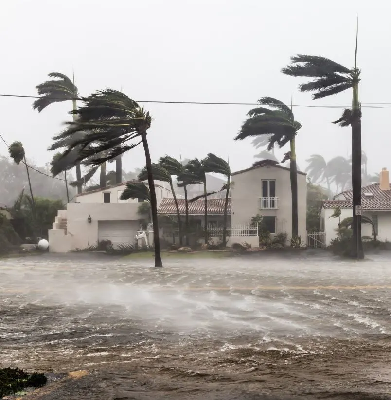 Tropical weather winds batter homes near coastline