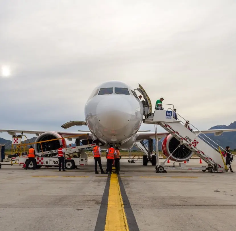 Passengers exiting a plane in Los Cabos