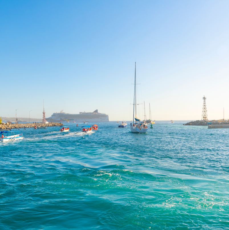 Los cabos water with boats and cruise ship