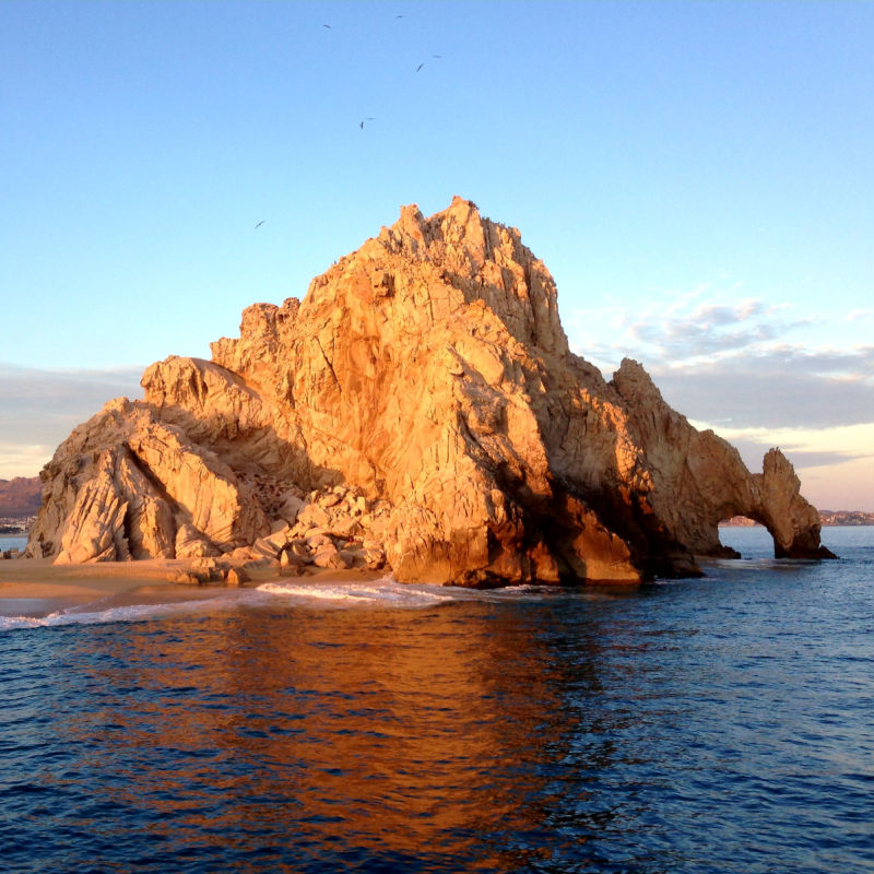 View of the Sun Setting on the Cabo San Lucas Arch from the Pacific Side