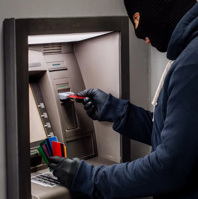 Credit Card Scammer at ATM Machine