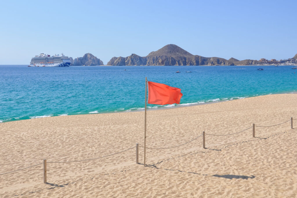 Red Warning Flag on a Beach in Los Cabos, Mexico