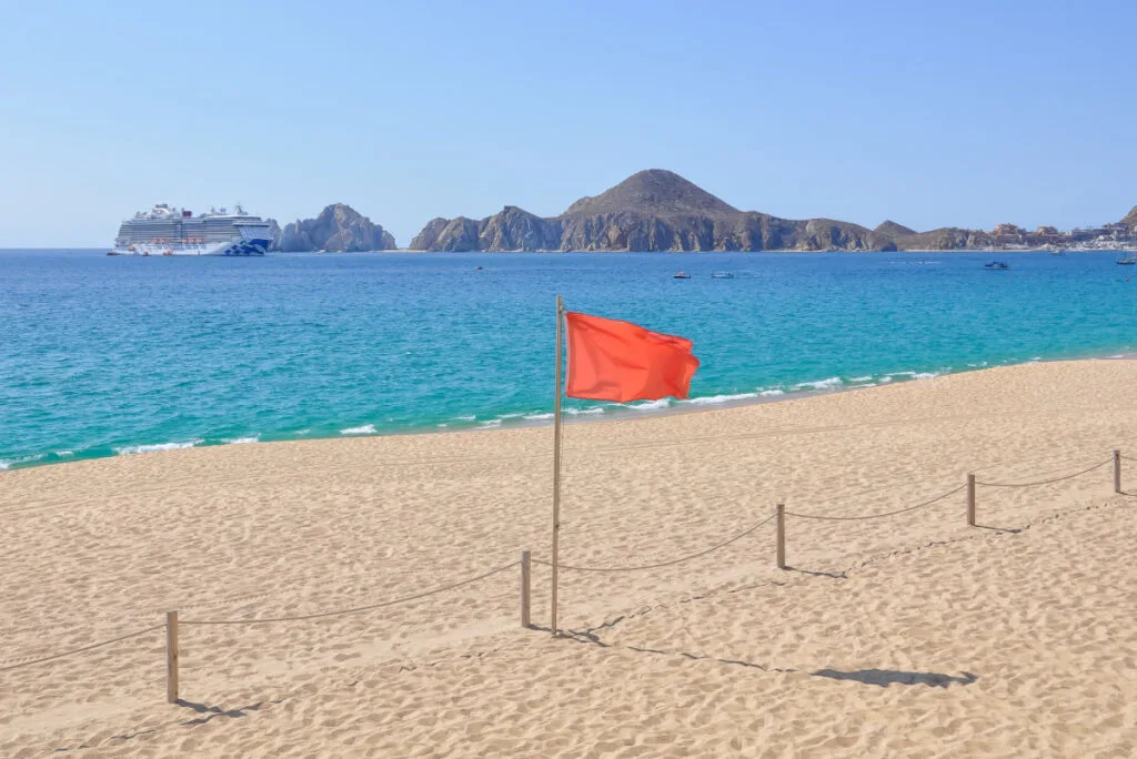 Red Warning Flag on a Beach in Los Cabos, Mexico