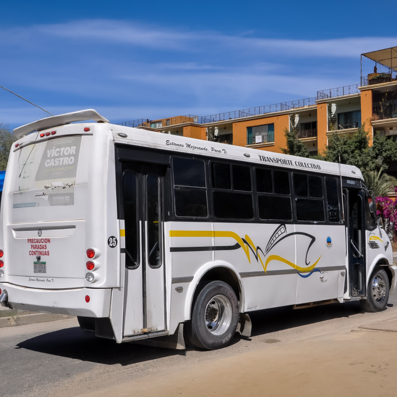 Colectivo Bus Driving Through Cabo San Lucas, Mexico