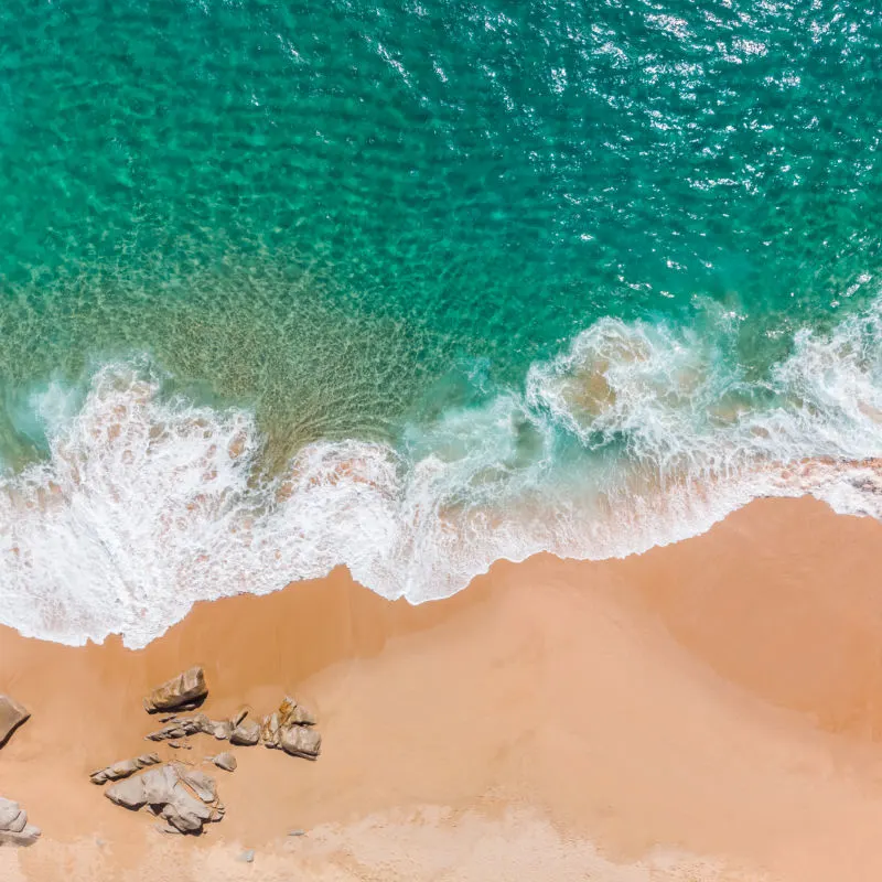 los cabos beach with wave crashing