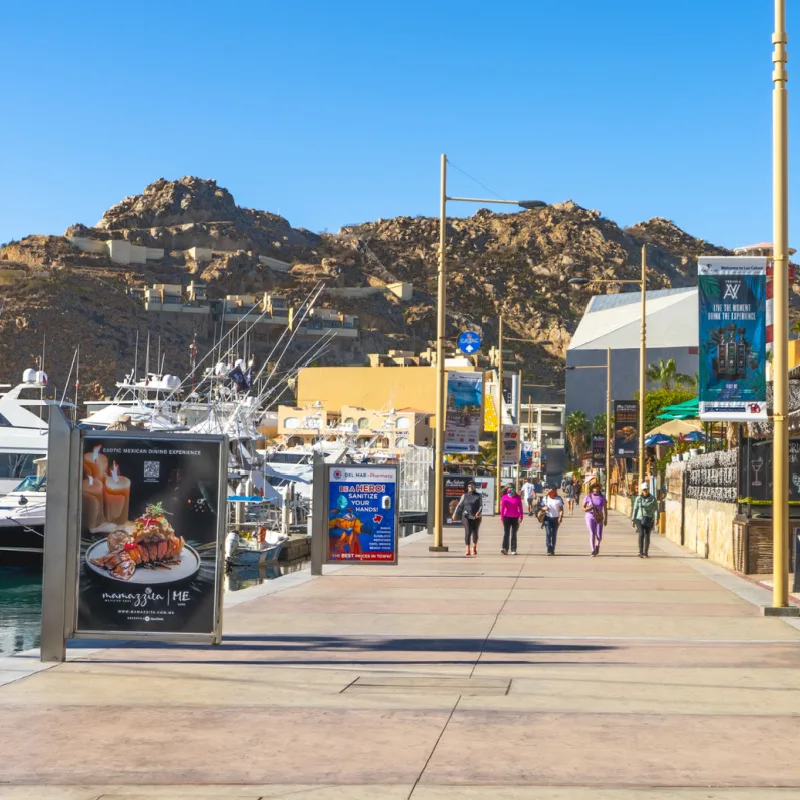 tourists walking through cabo