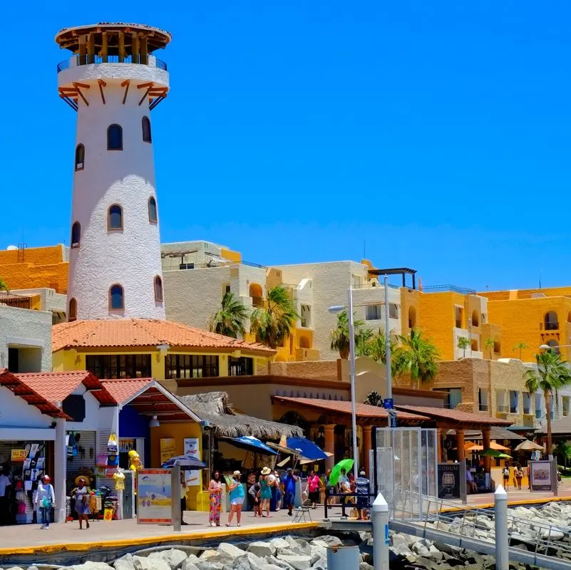 Tourists enjoying shopping at the harbor in Los Cabos